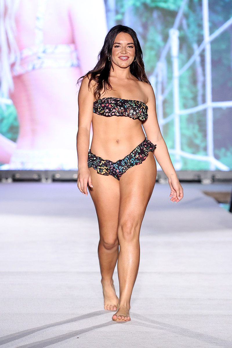  Mady Dewey walks the runway for Sports Illustrated Swimsuit Runway Show During Paraiso Miami Beach on July 16, 2022 in Miami Beach, Florida. 
